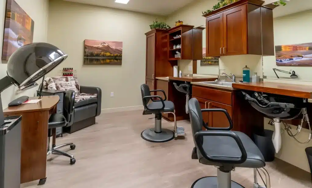 A cozy salon interior featuring two salon chairs