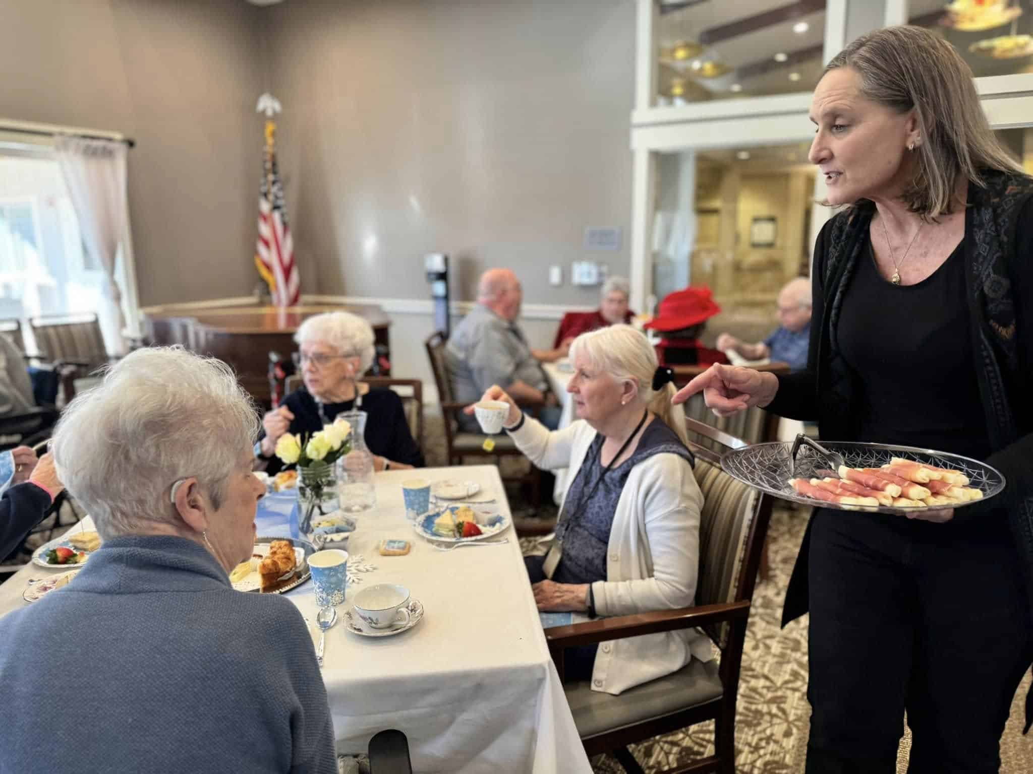 Residents enjoying a community gathering at The Lodge Retirement Community in Sisters, Oregon.